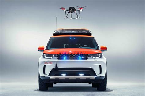 drone launching land rover discovery    red cross