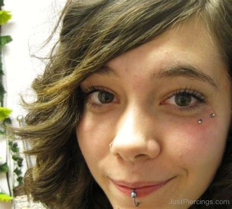 smiling girl  anti eyebrow piercing