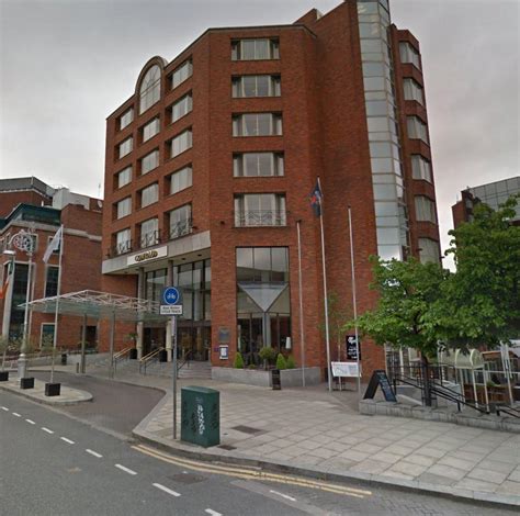 gardai investigating  workers  conrad hotel  dublin threatened  knives  armed