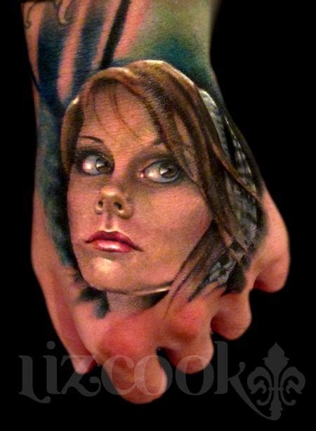 Realism Style Colored Hand Tattoo Of Woman Face Tattooimages Biz