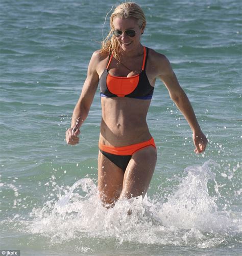 nell mcandrew showcases her beach body in a tiny bikini on dubai break daily mail online