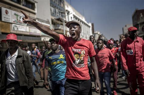 zimbabwe election one man dead as police clash with protesters daily