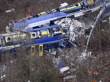 ten killed scores injured  trains suffer head  collision