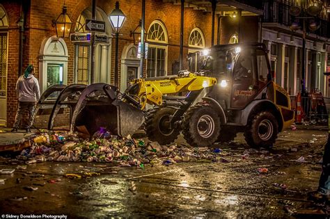 sanitation workers clear 50 tons of trash left behind by mardi gras