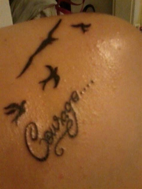 courage tattoo  doves  love  placement courage tattoos great