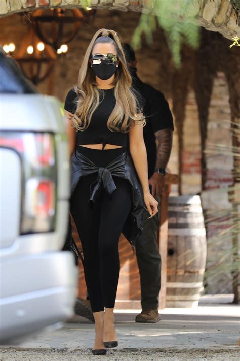 Khloe Kardashian 35 Sizzles In Sheer Top Leather Mini Skirt After