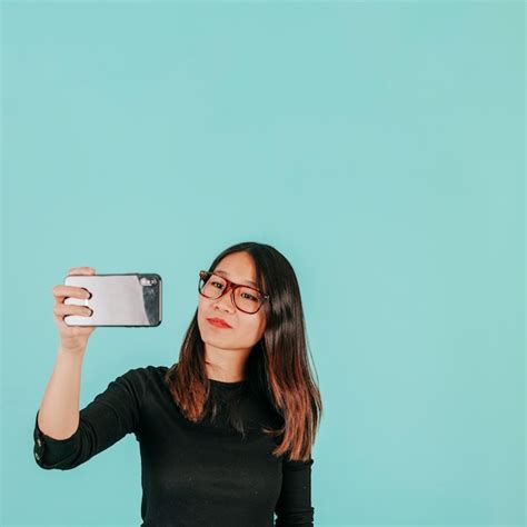 Free Photo Asian Woman Taking Selfie