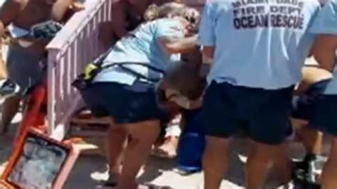 Shark Bites Both Legs Of Man Swimming At Florida Beach
