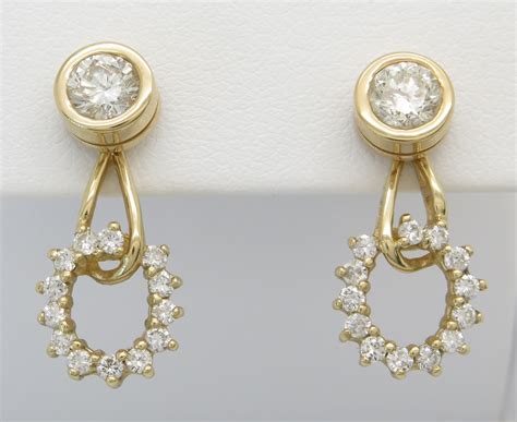 yellow gold ctw diamond stud earrings property room