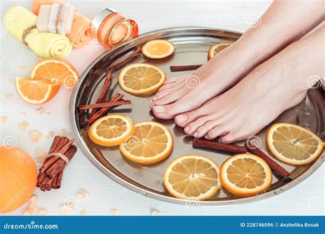 pedicure   spa salon  sliced oranges  cinnamon stock photo