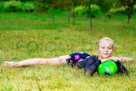 flexible little blondie girl doing stock image colourbox