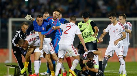 serbia albania euro  football qualifier abandoned  drone carrying flag sparks fight