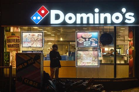 dominos pizza  set  deliver  price highs realmoney