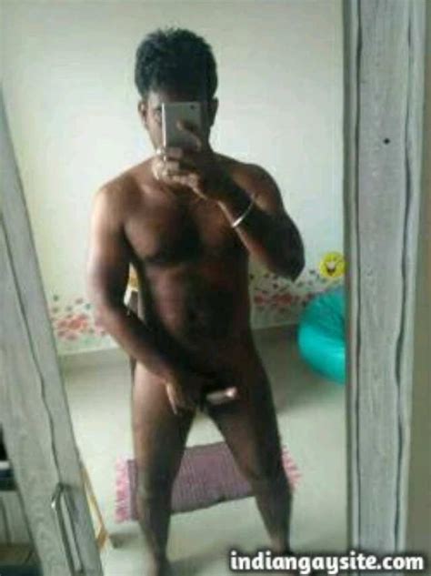 indian gay porn sexy desi hunk exposing his big and hard cock on the mirror indian gay site