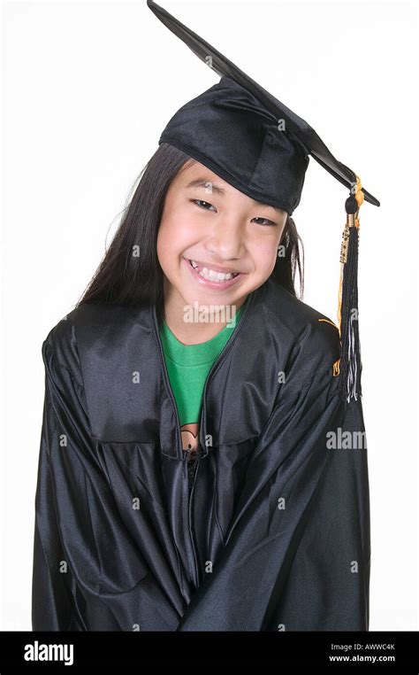young girl wearing graduation cap  gown stock photo alamy