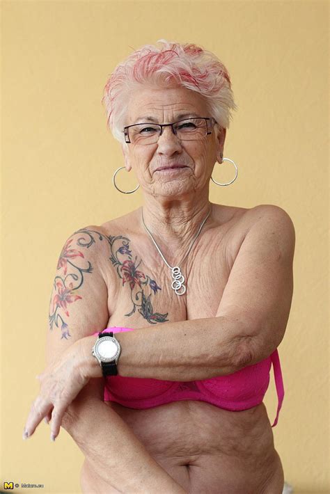 tattooed mature lady cuddle her pussy photos amanda s milf fox