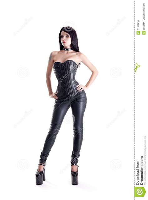 sexy goth girl in leather corset and pants royalty free