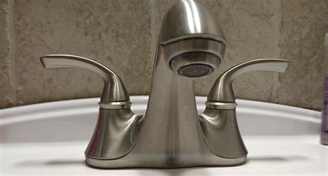 leaking kohler faucet    remove    unusual part holding