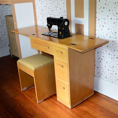 Vintage Singer 301 Sewing Machine And Vintage Cabinet Ebth
