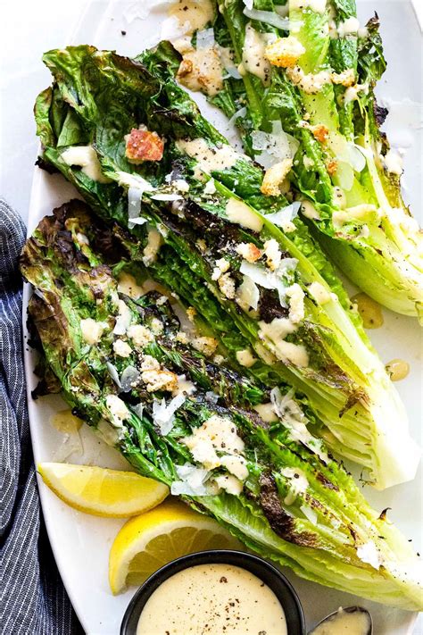 grilled caesar salad with leafy sections of romaine seared on the