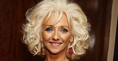 debbie mcgee 59 unleashes inner vixen in see through lace dress