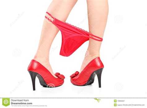 Sexy Woman Taking Off Her Red Pants Royalty Free Stock