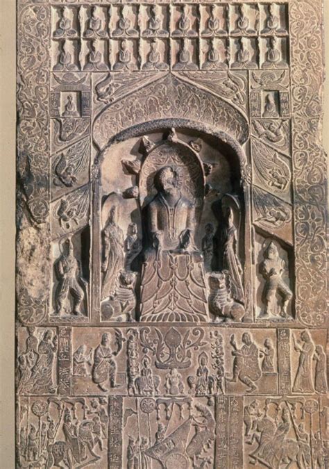 buddhist votive stele with carved buddhist figures and