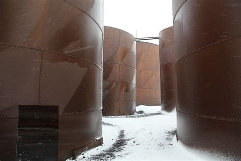 whale oil tanks  whalers bay deception island   snow flickr