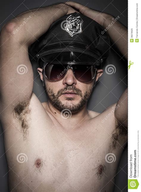 good looking policeman police with sunglasses over dark