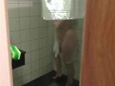 hidden cam caught masturbation public shower free porn