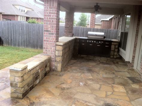 groundscape  fort worth landscape company install outdoor kitchen