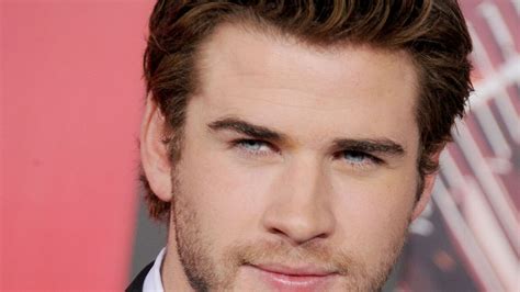 liam hemsworth says he s more grounded and much happier now after