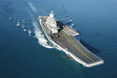 gray aircraft carrier ship aircraft carrier ins vikramaditya indian