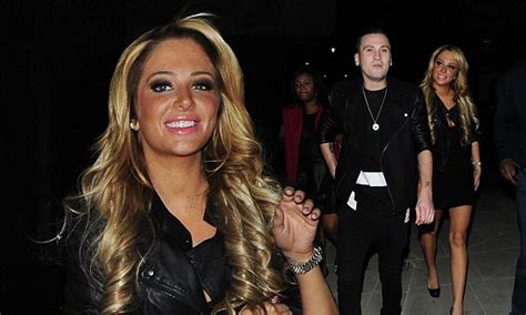 tulisa contostavlos is in high spirits as she emerges for