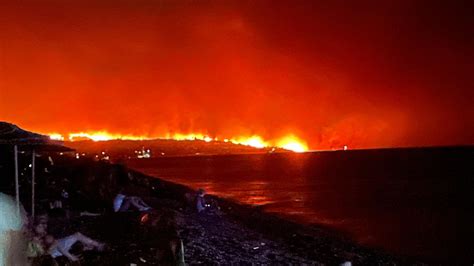 rhodes wildfires british tourist    escape  flames