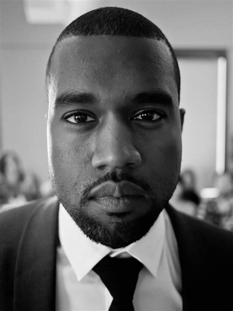 kanye west charged  battery attempted grand theft  photographer