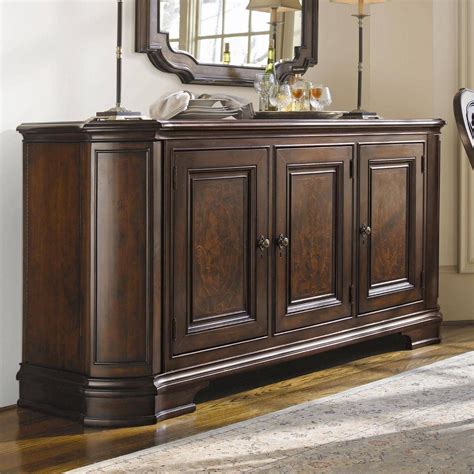 small dark wood sideboard showing