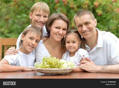 family eating fruits image photo  trial bigstock