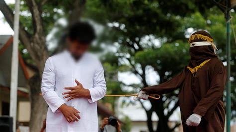 in photos indonesian men caned for gay sex in aceh world news