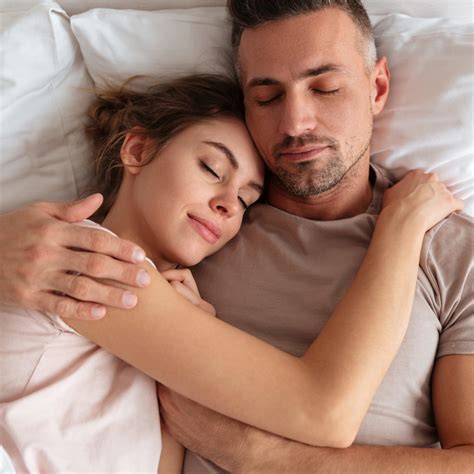 Top View Of Pretty Loving Couple Sleeping Together In Bed The Veranda