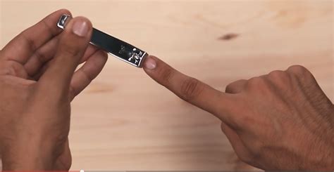 men practice their fingering techniques on fruit — video
