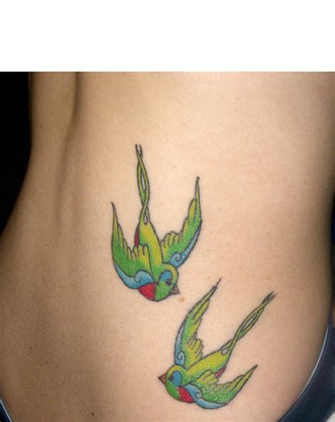 nicki minaj style swallow tattoo design