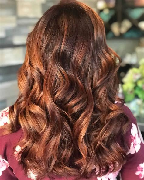 natural medium brown hair  light copper highlights