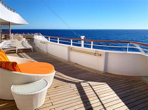 deck   cruise ship  wicker furniture   orange cushion
