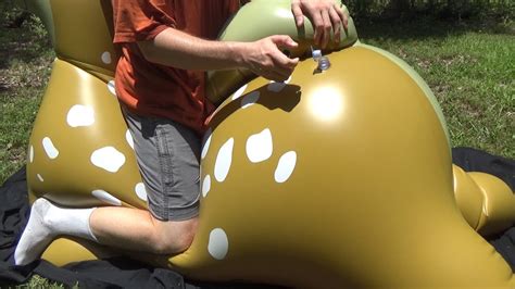 Squeezing The Air Out Of A Giant Inflatable Deer Toy