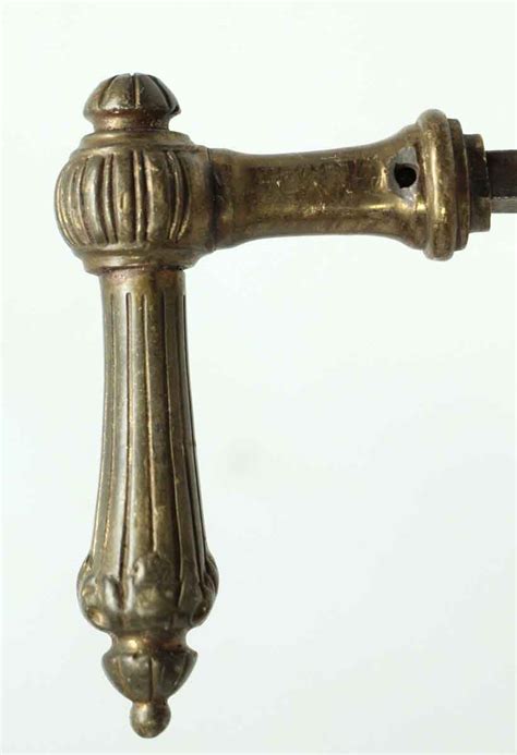 pair  bronze lever door knobs olde good