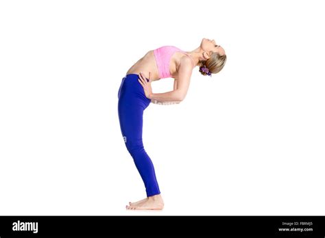 sporty beautiful young blond woman  standing  bend yoga