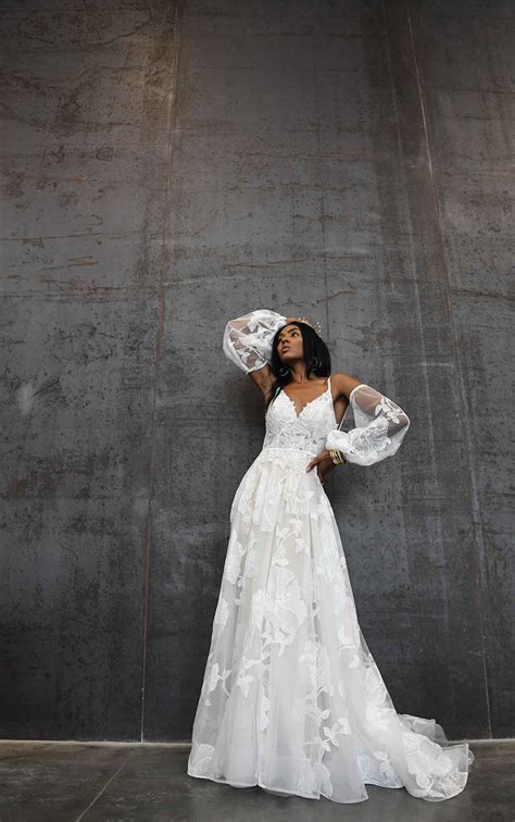 dreamy boho wedding dress with open back and botanical