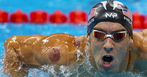michael phelps among olympians covered in large red circles from ancient healing technique of