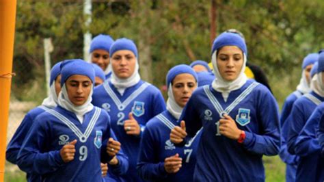eight of iranian women s football team are men awaiting
